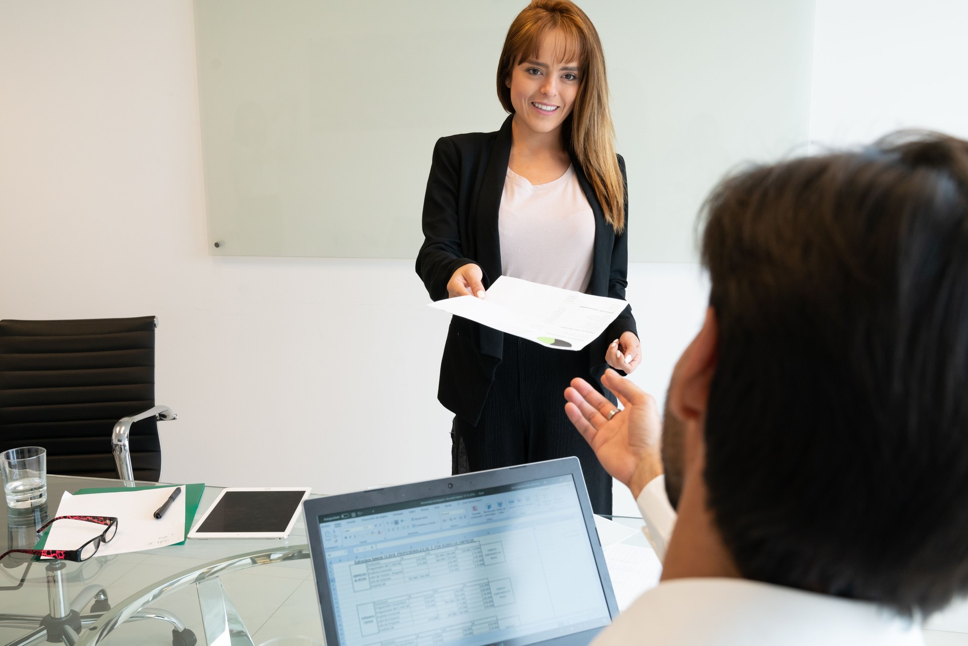 Latin business colleagues working in office